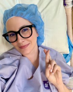 Clea Shearer Instagram - Heading into my second reconstruction surgery (and my fifth surgery since I was diagnosed with cancer). I’m a little anxious since this is a different procedure than last time. Apparently they can access the breast from my back?! Medical science is wild. I’m reeeeally hopeful that this will be my last reconstruction, but I know there’s a possibility of more in the future. I’ve accepted the journey that I’m on and know it’s ongoing. So today will get me one step closer to feeling whole again, and THAT makes me smile from ear to ear. Fingers crossed all goes well, and I’ll update you from the other side! Xo Clea 🤍
