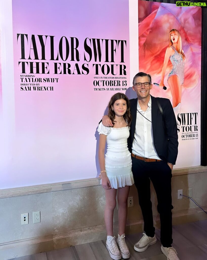 Clea Shearer Instagram - Stella and John at the premiere of The Eras Tour movie last week….posing with the photo John took for The Eras Tour movie. John earned a lot of points for take-your-daughter-to-work day. Stella’s priceless reaction when Taylor Swift walked into the room is on stories 💕