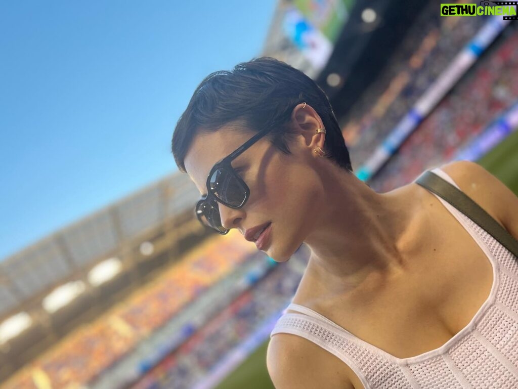 Conor Leslie Instagram - Went to my first football match yesterday and watched @premierleague play stateside (I know I’m the American here but “football” makes more sense and “soccer” doesn’t but hey, a lot of things don’t make sense to me over here) Also: this month was the first time I found out what it’s like not needing to always have an emergency hair tie on my wrist at all times: very freeing. A summer of firsts ✔️ 📷 by @carolineroses aka that really fun friend you bring to a football match who will split time between chatting but also *actually watching* the game 🤝
