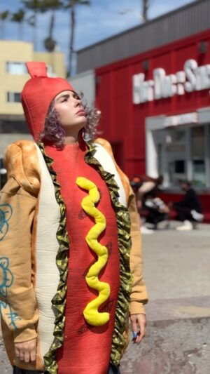 Courtney Nelson Instagram - WITH GREAT HOTDOG COMES GREAT RESPONSIBILITY 🌭

I was called upon to be the superhero we all need 😩🙏🏻🫡

P.S this is all on the spot improv, which makes these videos beautifully chaotic 

#hotdog #hotdogonastick #superhero #funnyvideos #improv #improvcomedy #trending #skit #comedy #memepage #fypシ