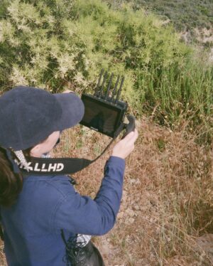 Courtney Barnett Instagram - Full-length visual accompaniment for End Of The Day directed by @oclaire available to watch now at the link in my bio. Huge thanks to this amazing film crew 💙💙💙
Director - Claire Marie Vogel
Producer - Annika Dawson
Set Producer - Lily Darragh 
Director of Photography - Tim Toda
Editor - Mitch Goldberg
Colorist - Taylor Black
Hair & Makeup - Leticia Llesmin
PA/CC - Mallory Lemieux
Camera Assist - Ethan Smith
Camera PA - Brayden smith
PA - Spencer Brown
Color Producers - Christina Caldwell   Stefanie Schaldenbrand at Apache
Filmed in Tujunga, California on Tongva land.
Photos by Claire Vogel, Leticia Llesmin, Mallory Lemieux, Ethan Smith & me.