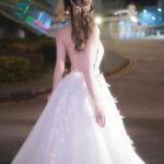 Crystal Fung Instagram - 探花於霧，如幻如真。 照片背後的故事：相機鏡頭因為室內外的溫差而起霧，意外為照片賦予了矇朧氛圍，造就了自然的柔和”濾鏡”。 人生， 總是充滿了意想不到的驚喜。 🪷 - - - - - - - Makeup & Hair : @kayowang Gown : @elysianbridal Accessories : @pamycarie