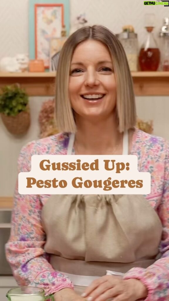 Damaris Phillips Instagram - Have you ever made gougeres? Watch the full episode of how to make these babies on YouTube now! Pesto Gougeres (cheese puffs) INGREDIENTS: 1 cup whole milk 8 Tbsp (4 oz) unsalted butter 1 tsp kosher salt 1 cup (5 oz) all-purpose flour or 4 large eggs 1 cup (4 oz) gruyere or Parmesan, shredded 1/8 cup pesto 2 tsp freshly ground black pepper Parmesan or Gruyere cheese, shredded or grated for sprinkling   Method: Preheat oven to 425 degrees F. whole milk and butter and salt in pan until boil. Add flour and stir to panade forms, pulls away and is smooth. Using a hand or stand mixer with paddle attachment, add eggs 1 at a time. Add the cheese, pesto and pepper and mix by hand to fold in the ingredients. Using 3/4 1 ounce portion scoop, scoop onto parchment lined cookie sheet. Sprinkle with cheese. Bake in preheated oven for 15 minutes, then lower the oven temp to 350 and cook for another 15-20 until the pastries have puffed up and have browned in color. When you remove them from the oven use a skewer poke a vent hole in the side to release the stream to prevent deflating.