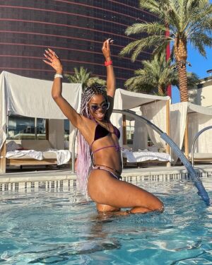 Danielle E. Hawkins Instagram - Listen… #JOY looks good on me!

👙 @berrybeachyswimwear code DHAWK20
📿 @goddesstreasurebox 

#fun #sun #vegas #ushermyway #workwife #happy #pooltime #bikini #swimwear #purplereign #braids #healthy #vegan #derby #melanin #brownbeauty #happyblackwomen #blackwomensmiling