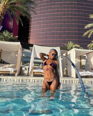 Danielle E. Hawkins Instagram - Listen… #JOY looks good on me!

👙 @berrybeachyswimwear code DHAWK20
📿 @goddesstreasurebox 

#fun #sun #vegas #ushermyway #workwife #happy #pooltime #bikini #swimwear #purplereign #braids #healthy #vegan #derby #melanin #brownbeauty #happyblackwomen #blackwomensmiling