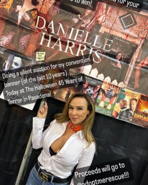 Danielle Harris Instagram - Been getting a lot of y’all wanting to bid on my personal banner (I’ve been taking this to shows for 10 years!!) so I’m going to open it up to everyone here as well! All $ raised will go directly to my good friend and stunt double Laura Dash’s charity @adoptmerescue I’ll will autograph it and personalize it and will ship it to you as well if you’re not at the convention this weekend! Please bid here below! Auction ends tomorrow!!! Bid is at $200 right now. Please bid in $20 increments! 😍😍😍
