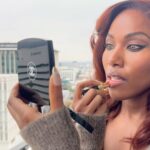 DeWanda Wise Instagram - 💄Lovah. {De applies lipstick in natural light.}