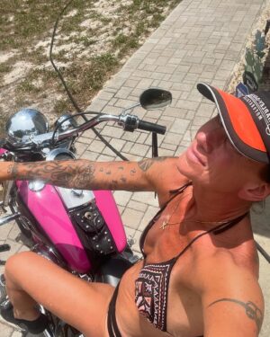 Debrah Miceli Instagram - Let’s ride!! 

My very first @harleydavidson ‘92 softail. Original #Harley factory magenta paint! 🩷 🔥