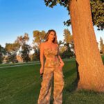 Destiny Monique Instagram - Just out here blending in with the trees…. Y’all need me to spy on someone for you, let me know? 👁️👁️ - Use my discount code for 15%off: awDESTINY @sheinofficial From the Shein Icon collection. -Tie dye tube top and flap pocket cargo pants set. . . . . #cargopants #camopants #ad #fashionstyle #shein #sheingals #makecamoyourcause