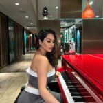 Destiny Monique Instagram - I love this red piano❣️ Just over here looking like I can play. Happy Monday my friends! 😁 . . . . #redpiano #piano #fashionstyle #pantssuit #matchingset