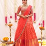 Dharshana Ashokan Instagram - Beautiful @dharshana_ashokan flaunting in orange with pink pleated Embroidered lehenga🌸🌸 Bridal Edit 2024 Ever beautiful @dharshana_ashokan Lens @haran_official_ Mua @makeup_by_kez Hair stylist @banuhairstylist Jewellery @challani_jewellery Decor @dj_flowers_garlands 🌸