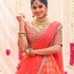Dharshana Ashokan Instagram - Beautiful @dharshana_ashokan flaunting in orange with pink pleated Embroidered lehenga🌸🌸 Bridal Edit 2024 Ever beautiful @dharshana_ashokan Lens @haran_official_ Mua @makeup_by_kez Hair stylist @banuhairstylist Jewellery @challani_jewellery Decor @dj_flowers_garlands 🌸