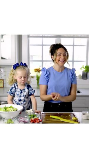 Dina Deleasa Instagram - The way she says “Oookaaay” is still exactly the same!!! And this strawberry salad is still a family favorite. The ingredients and dressing recipe is below!
 
This is for the OG DishItGirl crew- In honor of the impending holiday I thought this deserved to be let out of the vault! This video is from a little Mommy and Me series I did awhile back with my favorite Sous Chef. Siena and I ate all of our meals together until she went to preschool. Sometimes she would end up grabbing things off my plate. I think eating with her often encouraged her to try new things because she wanted to do what I was doing. Not the case anymore, but while she was little, it worked! So often when I would cook I would structure our meals with this in mind.  I would take the adult version and deconstruct it on her plate. Make it a bit more kid friendly without it being total “kid food.”
 
Now she gags over grilled cheese but will eat broccoli. It seems they all go through picky stages, she’s been in one for about the past two years! What is one meal you and  your kids can both enjoy together?!
 
10 oz of baby spinach and butter lettuce or mixed greens
1 cup strawberries, sliced
1 cup mozzarella balls (celigene style)
1/2 cup baby cucumbers sliced
radishes (optional)
avocado (optional)
Dressing
1/4 cup olive oil
1 tbsp balsamic vinegar
2 tsp honey
1 tsp shallot, chopped
2 tsp dijon mustard
kosher salt- to taste
pepper-to taste
1/2 tsp dried oregano
Pre-wash and dry your lettuce, strawberries, and any other produce you may want to use in the salad.
Give the lettuce a rough chop and add to a large bowl.
Slice the strawberries and mozzarella balls, add them to the salad bowl.
If desired, add in the avocado, radishes, and cucumbers.
In a small bowl whisk together ingredients until well combined.
Pour over salad, and toss gently to incorporate!