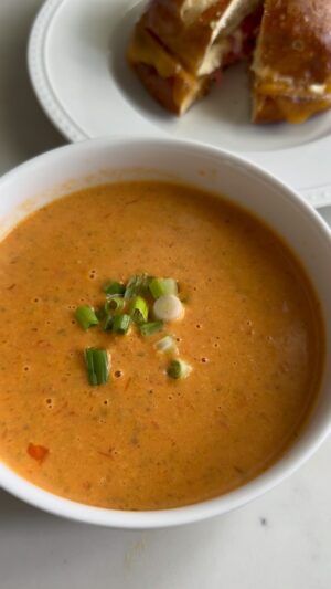 Dina Deleasa Instagram - Sometimes making something good to eat helps get me up and moving. Or sometimes the movement actually helps me read better after I eat when I’ve been down for the count all morning.

I made a rustic tomato soup using up some tomatoes I had from the garden, summered them in chicken broth, with scallions. If you have never paired scallions with tomatoes, you must ! I blended it up and returned it to the pot and added a bit of cream. I could have strained it out but I didn’t mind the texture .

Yes, my sandwich was a bit unconventional but I used what I had on hand ! I know it seems like a lot of work when your not feeling well. But it did give me a bit of new life ! 

What is your go to when your feeling low?

#dishitgirl #soupseason #tomatosoup