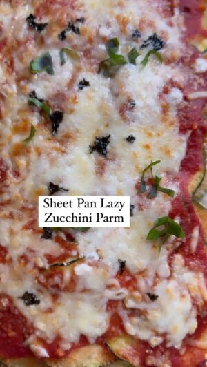 Dina Deleasa Instagram - When we came back from vacation we found the largest zucchini EVER in our garden. I didn’t feel like setting up the whole dredging station and frying up the zucchini, but I did love the idea of zucchini parmesan. I wondered if this would work on a sheet pan like a deconstructed lasagna. It was worth a shot and I am glad I took it!

Recipe-ish below! Follow @dishitgirldina for more everyday #dishspiration 

3 tbsp olive oil
1 garlic clove, minced
1/2 tsp kosher salt
1/2 tsp red pepper flakes (optional)
1/4 tsp black pepper
Whisk together and set aside.

2 large zucchinis, sliced into 1/16 inch rounds
kosher salt
1/3 cup Italian style bread crumbs, divided
1 cup shredded whole milk mozzarella cheese
3 tbsp parmesan cheese, divided
3/4 cup tomato sauce
fresh basil
Prep the zucchini by slicing into thin rounds, if using a mandoline 1/16 inch is the setting I used. Place the zucchini rounds in a colander and sprinkle with kosher salt. Let them sit for about 30 minutes, this will help draw out excess water. After 30 minutes, lay out the zucchini slices on a paper towel and pat dry.

Line a large rimmed baking sheet with parchment paper. Lightly brush the parchment paper with the olive oil mixture. Then layer on half of your zucchini rounds, about 3 or 4 across, overlapping each round and each row below. I did 5 rows.

Lightly brush some of the olive oil mixture over the layer of zucchini rounds, then sprinkle about 2 tablespoons of breadcrumbs over top, and 1/4 cup of mozzarella cheese, and 1 tbsp of parmesan. Then add another layer of zucchini rounds, overlapping the same way. Sprinkle remaining breadcrumbs over top. Then spread tomato sauce over top evenly. Top with remaining cheese, and fresh basil.

Place in the oven at 350 degrees for 35 minutes, then broil on high for 3 minutes until the top gets brown and bubbly.

If you have more zucchini you can repeat the process making a thicker parmesan!

#farmersmarketfinds #gardenrecipes #zucchinirecipes #healthyfood #healthyrecipies #sheetpandinner #easyrecipe #easydinner