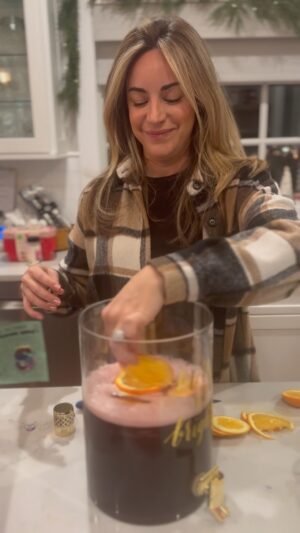 Dina Deleasa Instagram - Need a big batch cocktail for this weekend? May I suggest the Home Alone inspired, “Les Incompetents” sounds fancy and french, but it is super simple! Add all the ingredients into a big pitcher and stir! Maybe freeze the orange slices before putting them into the container to help keep the drink cool! If you need the recipe for the simple syrup you can check my web site and I might post a quick reel later on!

Make sure you are 21  to enjoy!

2 bottles of merlot
3 cups pineapple juice
1 bottle prosecco
3/4 cup chambord
1/4 cup cinnamon simple syrup (recipe on dishitgirl.com)
1 orange, sliced

#batchdrinks #christmasparty #christmascocktails 
#cocktailrecipes #easyrecipe