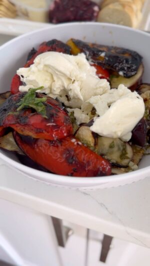 Dina Deleasa Instagram - Your sign to grill up more than some burgers this weekend!

My favorite veggies to grill are peppers and eggplant slices. I brush a mixture of olive oil , chopped garlic, basil, salt and pepper over top before charting them on each side. The grill temp is at 450, the peppers take about 6 minutes per side, the eggplant is more like 8 minutes.

Then I pour the remaining dressing over top of the bowl or platter, my newest addition is breaking up some burrata over top.

The leftover grilled vegetables are great to use in wraps over the next week for lunch!

#dishitgirl #summerrecipes #grilledvegetables #buratta #farmersmarketfinds #grillrecipes #easyrecipes #todayfood