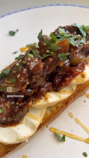 Dina Deleasa Instagram - This morning I picked a bunch of cherry tomatoes from my garden and instantly thought of this recipe.

One way to keep your summer cherry tomatoes a little longer, turn them into this sweet, spicy and savory jam. Then make sure to use it to top a thick slice of Italian bread, a crispy chicken cutlet, or with pasta . 

Now bring on the holiday recipes ! 😍

1 pint cherry tomatoes
2 tbsps balsamic vinegar 
1 tsp honey
1/2 tbsp kosher salt 
1 tsp black pepper
1 tsp red pepper flakes (more if you want it spicier!)

Add the tomatoes, vinegar, honey, chilli flakes,pepper and salt to the saucepot.

Stir to combine and bring to a boil.As the  tomatoes heat up they will blister, press down gently with a spatula to help them burst along the way.
Reduce the heat to a simmer and allow to cook for about 30 minutes until the ingredients have thickened and turned into a jammy texture.
Remove from heat. Allow to cool and then transfer to a small jam jar or glass container with a lid. Seal and store in the fridge and enjoy as you wish for up to two weeks.

#dishspiration #cherrytomatoes #inmygarden #tomatoseason #easyrecipe #gardenrecipes #farmersmarketfinds