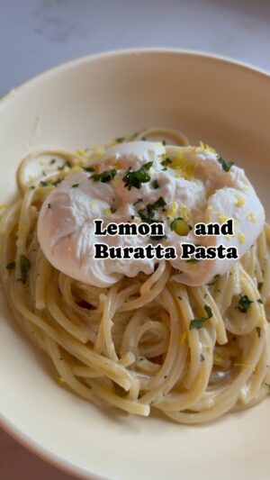 Dina Deleasa Instagram - Does it even matter that this a creamy lemon sauce when you put a ball of burrata on top of it ?! 

Maybe it does so I’ll drop the recipe below 👇 
Ps - Mariah Carey Fantasy Friday, you are welcome !

4tbsp unsalted butter
1 tbsp olive oil
2 tbsp finely sliced shallots
Juice of one lemon 🍋 
1/2 cup heavy cream
1/2 tsp kosher salt 
1/4 tsp pepper
2 balls of burrata 
1 tbsp chopped Basil 

Cook pasta according to packaged directions. Reserve 1/2 cup pasta water before draining .

I’m a large sauté pan melt the butter then add in the olive oil and shallots. Sauté on a low heat about 4 minutes, until opaque. 

Add ok the lemon juice stir gently to combine , then add in the heavy cream, lemon zest, salt, and pepper. Stir to combine . 

Let it simmer together for about 4 minutes add in reserved pasta water and cooked pasta, toss gently to combine , add in basil and toss once more.

Divide the desired pasta between two plates and top with burrata and enjoy !

#burratta #burratagram #easydinner #pastalover #dishitgirl #summerrecipe #lemonpasta