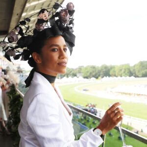 Dominique Tipper Instagram - My first Ascot was an absolute movieeee.
I won on all 5 races I bet on 😳
Thank you to @longines for having us and draping my wrist in one of your beautiful timepieces ⌚️ 
Thank you to @racheltrevormorgan for my stunning headpiece 👒 
Suit is @tedbaker 
Style and luck is my own 😏
Thank you @sulescorner 🖤