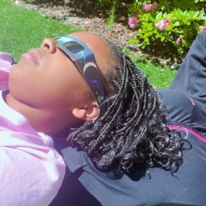 Dr. Contessa Metcalfe Instagram - Just me and my Dawg 🌒 

#SolarEclipse2024 #Playinghookie #TooCoolForSchool #DrContessa #HauteDoc #MetcalfeFamily #Frenchie 🐶 #FrenchieLife