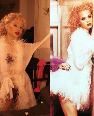 Elizabeth Berkley Instagram - SHOWGIRLS 👯‍♀️This past week, the magical @arianagrande recreated my #Nomi for #halloween with all the love and attention to detail that only an artist with her heart and creative genius could do. 

I adore you, @arianagrande and love how you and @lizgillz had fun with #nomiandcrystal in a way that only you two could. When you are from #differentplaces you have to watch your back because when you are wearing @versace  #versayce #theresalwayssomeoneyoungerandhungriercomingdownthestairsafteryou 🌋😝🥰❤️🔥🌟🎬
Always grateful to the genius @byellenm for creating the most incredible looks for Nomi. @davidcraigforrest for visionary makeup and #marieangeripka for hair magic 
Your creative team is genius too: @manthony783 💄#halloween