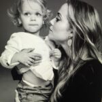 Elizabeth Berkley Instagram - All kinds of feels as our babies grow… right?! first day of school -5th grade and this photo popped up after drop off. ❤️😭 Time is moving fast. Grateful to get to be so present to the gifts and making magical memories. No greater role I’d rather be than mama to this boy and parents with my love ❤️ @greglauren #mysky #love #family 📸:the amazing @markseliger ❤️❤️❤️