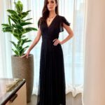 Elizabeth Tulloch Instagram - Thank you to the Academy of Science Fiction, Fantasy, and Horror Films for the win for Best Science Fiction Television Series at the 50th annual @saturnawards. I am so proud of @cwsupermanandlois writers, producers, cast and our incredible crew for all their hard work and dedication. And thanks to @gberlanti and Sarah and everyone else at Berlanti Productions, DC Comics, Channing and everyone at Warner Brothers Studio, and the CW for your ongoing faith and support in us. I was honored to be nominated in the Best Actress category and I’m so happy for Rhea Seehorn because she is tremendous on Better Call Saul and she deserved the win. ❤️ Thank you to Lena Bratschi at @carasoin for her absolute magic. Best facialist in the United States - just beyond phenomenal. I so appreciate your talent and love for what you do. THANK YOU to my amazing glam team @stephensoliito and @dickwycollins hair - once again you two knocked it out of the park. Thank you to our wardrobe designer @katrinamccarthycostumes for finding this gorgeous vintage chiffon Prada dress (it was pulled for quinceañera episode for last year but never worn!). Thank you to my dear friend Lisa @vancouvermedicalaesthetician at @theskingirls for creating @sgskinedition - I never travel without it when I’m flying because my skin gets so parched. And to @lymalife because I am obsessed with their handheld laser - I use it every morning before work for an instant lift. It’s incredible 👏👏👏 And lastly thank you to my lovebug @mrreggielee - the green necklace was a birthday gift from him a few years ago and I thought it would be perfect to wear to a show honoring science fiction and supernatural and fantasy - a little #Grimm love representing, too. ❤️