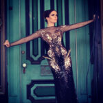 Elizabeth Tulloch Instagram - Throwback to this photo shoot with amazing photographer @franzszony. If you’re not familiar with his work, check it out! This was such a gratifying shoot, wandering around the streets of dusty Nevada, telling a different story with each photo. Gowns by @michael5inco 🖤