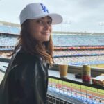 Ella Purnell Instagram - peanuts and cracker jack!!!! Thank you @healthade @dodgers for making this Brit’s first baseball game so fun :)✨