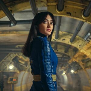 Ella Purnell Instagram - Please enjoy this new high quality photograph of Lucy. She’s an upstanding member of Vault 33, where she spends her time preparing for the future!