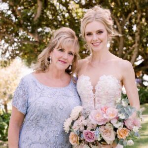 Elle Evans Instagram - 🌻Julie Cecille Conly 💛 
🌜May 12, 1964 - April 20, 2023🌛
Today would’ve been my beautiful Mother’s 59th birthday. She was truly a divine light, a rockstar in her own right. She lit up any room she walked into, was the life of the party, & never met a stranger. To know her was to love her! She always knew how to make someone smile & would bend over backwards to help anyone in need. The last 7 years of her life were full of hard times but she never let that dull her sparkle. She bravely fought her cancer with a smile on her face & hope in her heart. She was beside my step dad every single day as he endured a traumatic brain injury & saved his life on multiple occasions. She was the best Mother to me imaginable, always encouraging me & supporting my dreams even if those dreams took me far away from her. Her grandkids brought her so much joy & she spoiled them rotten! I will always remember her laugh, & how incredibly special it was for her shining sunflower soul to ascend into the heavens during the solar eclipse. I love you so much Mommy, you’re always in my heart 💛🌻