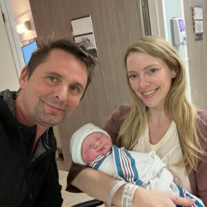Elle Evans Instagram - We are so pleased to announce the arrival of our new baby angel boy 
💙George Julien-Wade Bellamy🩵 
Born on Sunday May 12, 2024. The most special blessing born on Mother’s Day & what would’ve been my late Mother’s 60th birthday. Named after Matt’s Dad George, my Mom Julie, and my cowboy dad Billy Wade Evans. He arrived healthy, happy, and handsome as ever!!! We are obsessed & basking in newborn heavenly bliss!!! I am recovering well and he has already settled into such a nice routine. So grateful to my wonderfully perfect husband @mattbellamy for being so supportive & by my side every step of the way! It’s an honor to bring another brilliant Bellamy into existence!