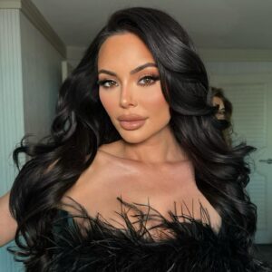 Emelina Adams Instagram - A moment for the glam 💖✨

Makeup: @oliviarosebeautyy 
Hair: @stylesbysuzy 
Dress: @marciano