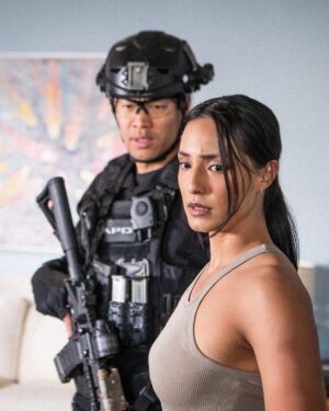 Emily Alabi Instagram - Olivia’s SuperTAN came to the rescue. 🙌🏽

Had a blast shooting this 😅 I always want to use my physicality as much as I can, whenever I can, so a huge shoutout to the stunt team for walking me through everything, making sure I felt super safe and comfortable while also empowering me to kick a**. 💪🏽

So so fun!!!!

🔫 @davidbradleylim 
📸 @davinophotostudio 
📺 @swatcbs @swatwriters 

#swat #cbs