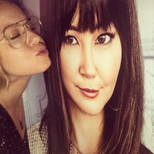 Emily Althaus Instagram - I just watched my **really beautiful** friend be **very funny** in the new season of @lizaondemand , and while we did take pictures together, I have chosen to showcase these creepier photos. @ohlittleasianone I love ya. And I took home this poster. I’m not sorry. #lizaondemand #oitnb #stepdad