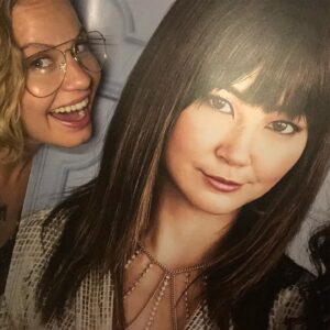 Emily Althaus Instagram - I just watched my **really beautiful** friend be **very funny** in the new season of @lizaondemand , and while we did take pictures together, I have chosen to showcase these creepier photos. @ohlittleasianone I love ya. And I took home this poster. I’m not sorry. #lizaondemand #oitnb #stepdad