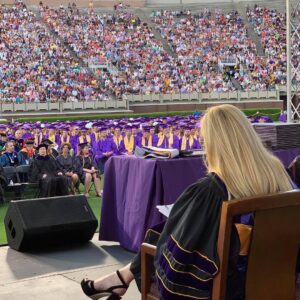 Emily Procter Instagram - Congratulations to ECU class of 2019! Thank you for letting me join you.  Ride on! #piratenation💜⚔️