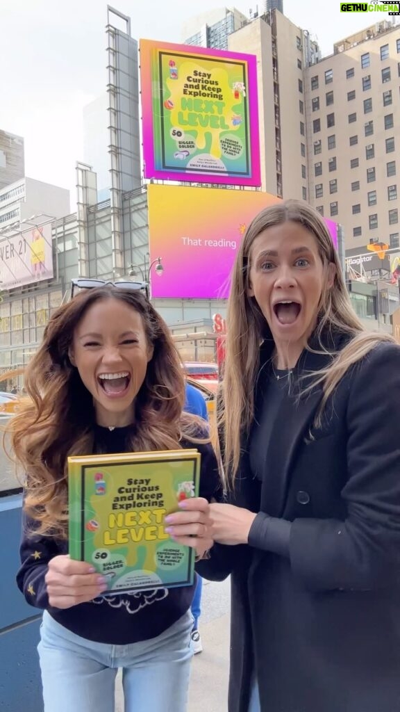 Emily Calandrelli Instagram - Girlhood is jumping, squealing, and hugging in NYC over a billboard 🥹 But also, more importantly, in the most epic of second career moves - my friend @beckykaleo just PASSED THE BAR EXAM! She finished law school and studied for the test all while pregnant and becoming a mom to beautiful little baby boy. Women are amazing 💗 Thank you to @amazonbooks for featuring my book Stay Curious and Keep Exploring: NEXT LEVEL