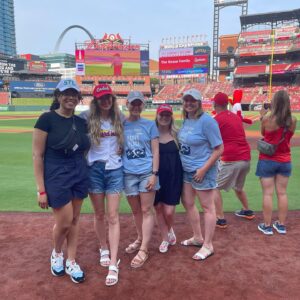 Emily Henry Instagram - Thank you all so much for coming out last night to Busch Stadium for the pre-game book club. This was one of the most special days for me of the last five years. There are no words for what it was like to get to meet so many of you. Thank you for driving and flying from all over, and for beautiful friendship bracelets, and for your letters and pencils, and for wearing your rodeo and Goode Books and Sunshine Falls Gear. It was a joy and an honor to sweat on you. 
A huge thank you to the Cardinals for the invitation, @juliepens for being the perfect in-conversation partner, @abergeron11 @dachejordan @daniellekeir_ and @tayhaggerty for being there for every moment of it!! I did not face my greatest fear (throwing an opening pitch) but I did face my second greatest fear (high-fiving a mascot), and that’s not nothing.
💙💙💙💙💙💜💜💜💜💜