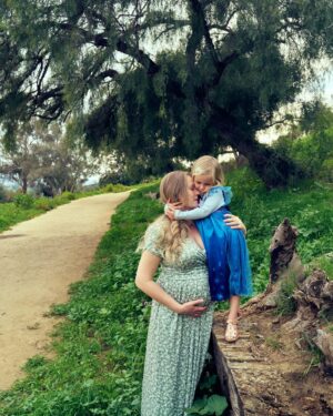 Emma Bell Instagram - I’m grateful for having a day on the calendar where as a  mother I’m entitled to relish in the gratitude coming from the people in my life. Truly, it’s such a luxury to be given coffee in bed and have pancakes made for me and be given the cutest card from the cutest person on the planet. I wish we could make it more accessible to caretakers of all kinds to feel as supported and nourished most days as we do on Mother’s Day. I could not do this without the small acts of kindness from people in my daily life. The person who holds the grocery door open as I wheel my giant cart through with a toddler playing monkey bars on it. The mother of a much older child telling me ‘you’re doing great, I see you’ when my kid throws a tantrum while being put in the car seat. The air steward who gave Pfeiffer a teddy bear when she didn’t want to play with any of the hundred toys I packed for the plane ride. Just a nod, or a smile or a word of encouragement goes so far. And to the other mothers who are also running on empty who have stepped in and held me, cried with me, laughed with me and been life altering teachers as we navigate this journey together I can not express how much you have saved my sanity and altered my life in ways I will never truly be able to comprehend. Happy Mother’s Day today and every day for all mothers of all kinds, shapes, sizes, genders and circumstances. You are what keeps this world wondrous.

📸- @jonathanducrest