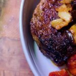 Emma Myles Instagram - Hi I made this pork chop a few nights ago and it was friggin amazing and the supporting cast was cheddar polenta with roasted eggplant and tomato confit and yes I was watching Real Housewives of the Potomac when I shot the glamour video thank you K BYE