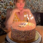 Emma Myles Instagram - You know, I was seeing everyone’s years in review and I was like, I feel like I did nothing. But then I was like, wait a lot of things happened this year. We had 2 🪧’s, I turned 40, I was blessed by Tori Amos, I got my first tattoo, I went back to my homeland, and I basically wrote 2 books. It’s hard when things are happening in a vacuum. It feels like time is just moving and here you are, standing still, the same. But I’m not the same. I am older. My brain has worked harder than it ever has. And I’m coming up on 3 years eating disorder recovery which is enough in and of itself. I don’t have a new year new me goal. I don’t need to be new. And neither do you. I just want to fill my life with happiness and gratitude and art and people I love. I just hope I don’t cut my bangs too short like I did 20 minutes before Valentine’s Day dinner last February. It took way too long to grow them back to normal. To all of my friends who understood that I just couldn’t, to my husband who pulled me up when the quicksand was swallowing me, to my cat who will always be my soulmate, to food, to the miracle of the human body and the resilience of the human mind, to a year that really and truly happened… I am grateful. Happy new year.