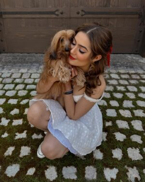 Emmy Perry Instagram - Today, on #adoptashelterpet day, I’m celebrating with my sweet rescue pup—who, in truth, rescued me. His unconditional love lifts me up during my lowest moments, and his joyful presence brings light into my darkest days. He’s not just a pet; he’s a radiant source of endless love and happiness. Adopting him wasn’t just saving a life; it was gaining a best friend. ❤️❤️❤️❤️