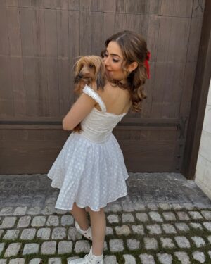 Emmy Perry Instagram - Today, on #adoptashelterpet day, I’m celebrating with my sweet rescue pup—who, in truth, rescued me. His unconditional love lifts me up during my lowest moments, and his joyful presence brings light into my darkest days. He’s not just a pet; he’s a radiant source of endless love and happiness. Adopting him wasn’t just saving a life; it was gaining a best friend. ❤️❤️❤️❤️