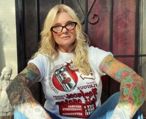 Erika Eleniak Instagram - Gotta check out this cool merch from my new favorite band 20 Minutes Til Sunrise. I’m wearing the cherries 🍒 but the T-‘s also come in Blackberry, grape & more… so cute and the music is the best vibe ever…