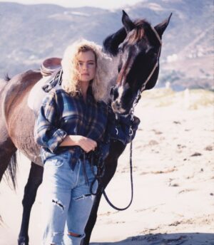Erika Eleniak Instagram - Happy Weekend!

#flashbackfriday 
#baywatch 
#beachlife 
#horses