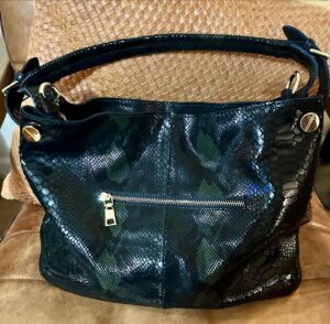 Erika Eleniak Instagram - Thank you, Annie Diamantidis! For my gorgeous Helen Hobo Handbag. It is absolutely beautiful and functional for all my “ stuff” to stay organized. Not an easy task! And look so good while doing it. 
@anniediamantidis 
#anniehandbags