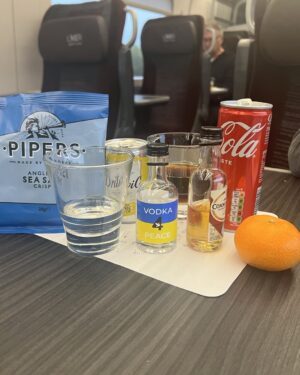 Erin Brockovich Instagram - Breakfast of Champions. Delayed trains and these are our options. Chips, Oranges and booze. Scotland here we come!