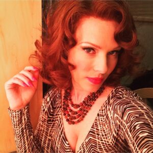 Erin Cummings Instagram - Red nails, red lips, red baubles, red hair…

This blast from the past popped up on my timeline so let’s make it a “Mother Marge Monday.” Mother Marge would say, “Every day deserves red lipstick.”

Whether you’re kissing someone today or not, a red lip always makes a gal feel better.

Happy Valentine’s Day to everyone out there. Love yourself and everyone around you! 

@astronautwivesclub #HappyValentinesDay
#redheads
